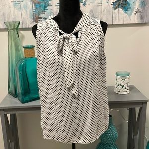 Black and white polka dot blouse with tie neck